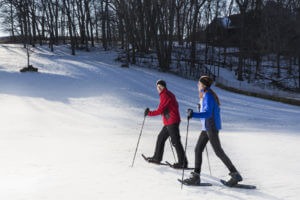 couple snowshoeing