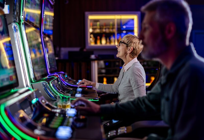Person playing bingo at a casino gaming area in Black Hawk, CO, & the Denver metro